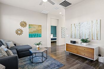 A living room with a couch and a coffee table